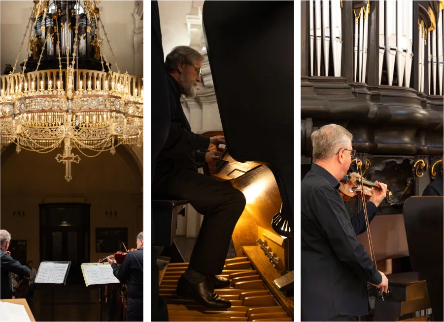 Classical concert with an audience in the Baroque interior of St. Nicholas Church in Prague